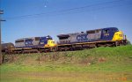 CSX 7873 & 8452 lead a train southbound out of the yard